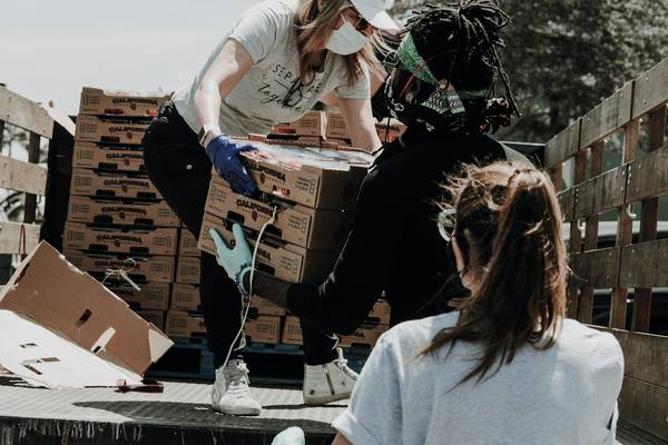 Volunteers sorting boxes